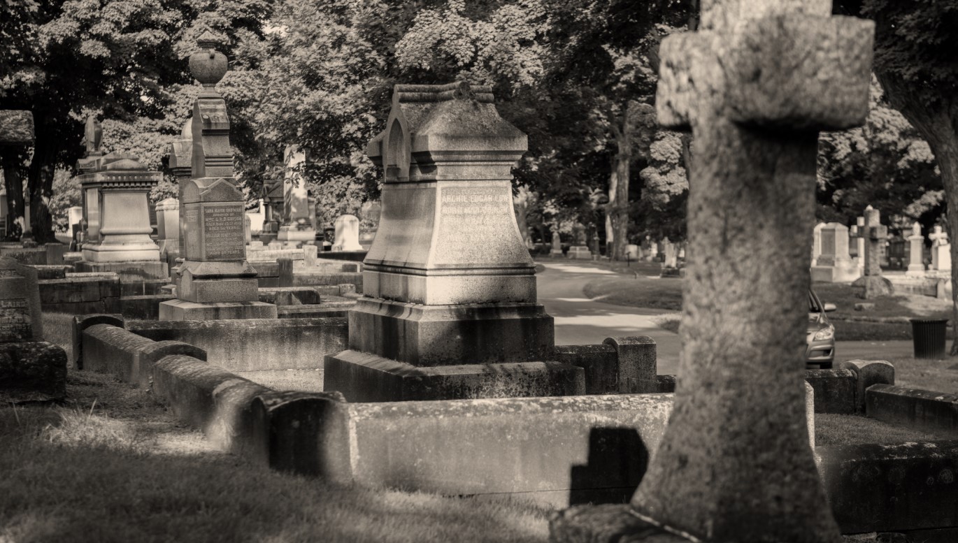 Black and white picture of older section of cemetery