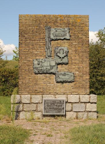 Terneuzen, Holland - september 1, 2019: a monument behind the sea wall of the western scheldt to remember world war ii