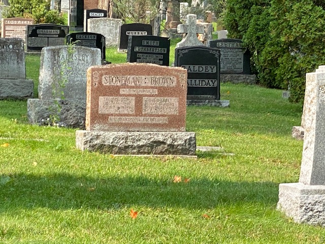 Detective Stoneman's Monument - Its red granite with his name and his family